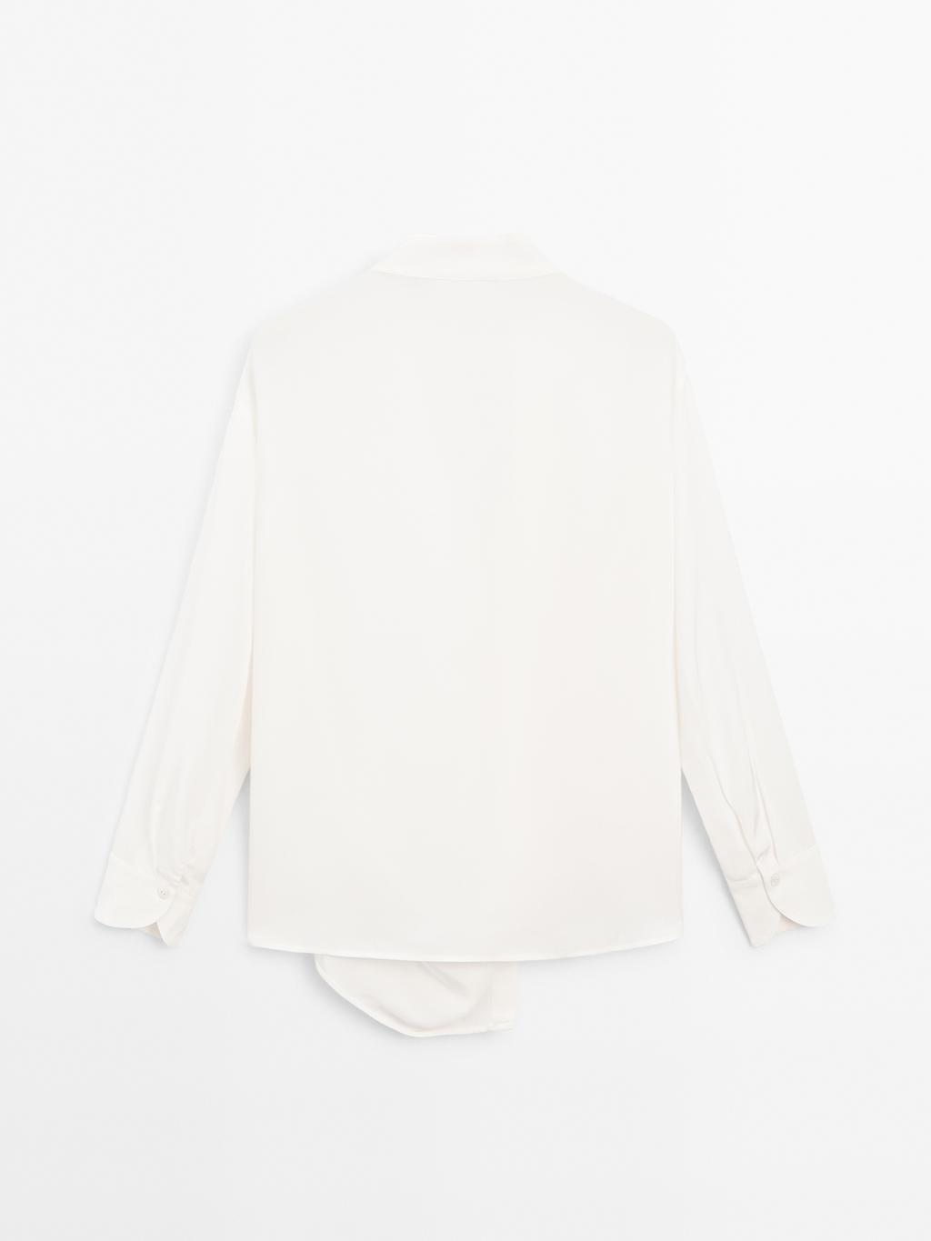 Blouse with knotted neckline and brooch detail