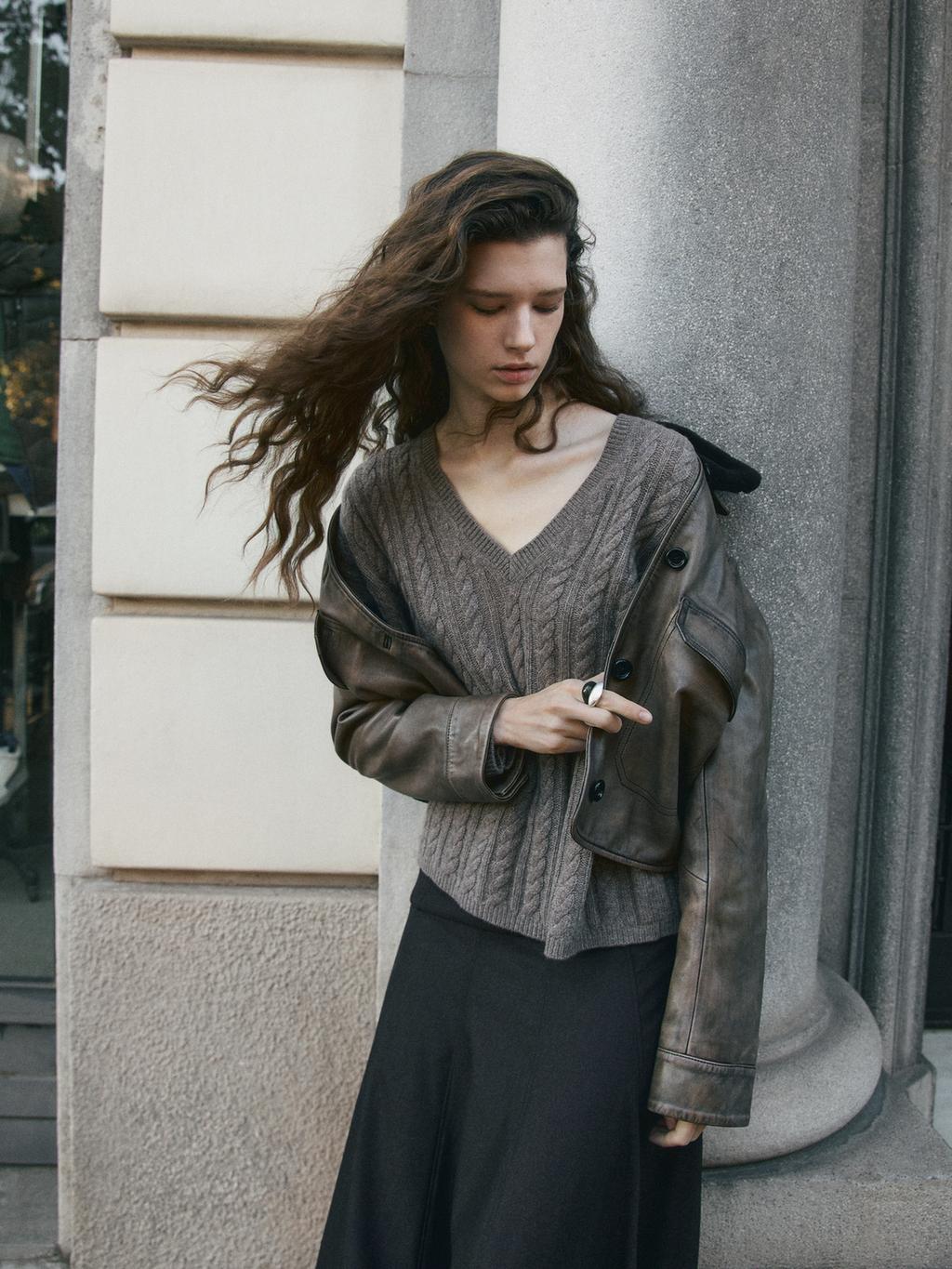 Cable-knit V-neck sweater