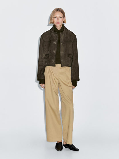 Suede leather jacket with lined buttons