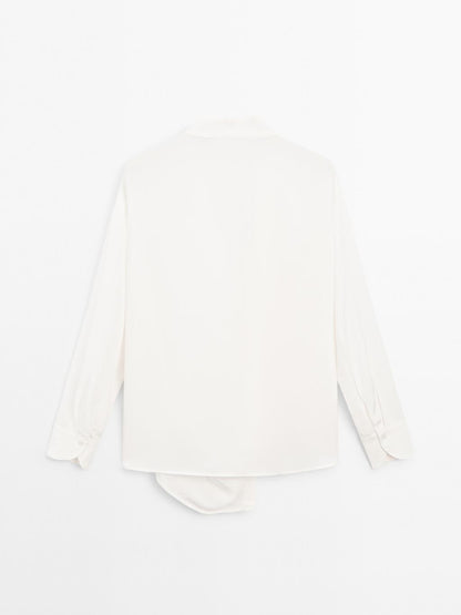 Blouse with knotted neckline and brooch detail