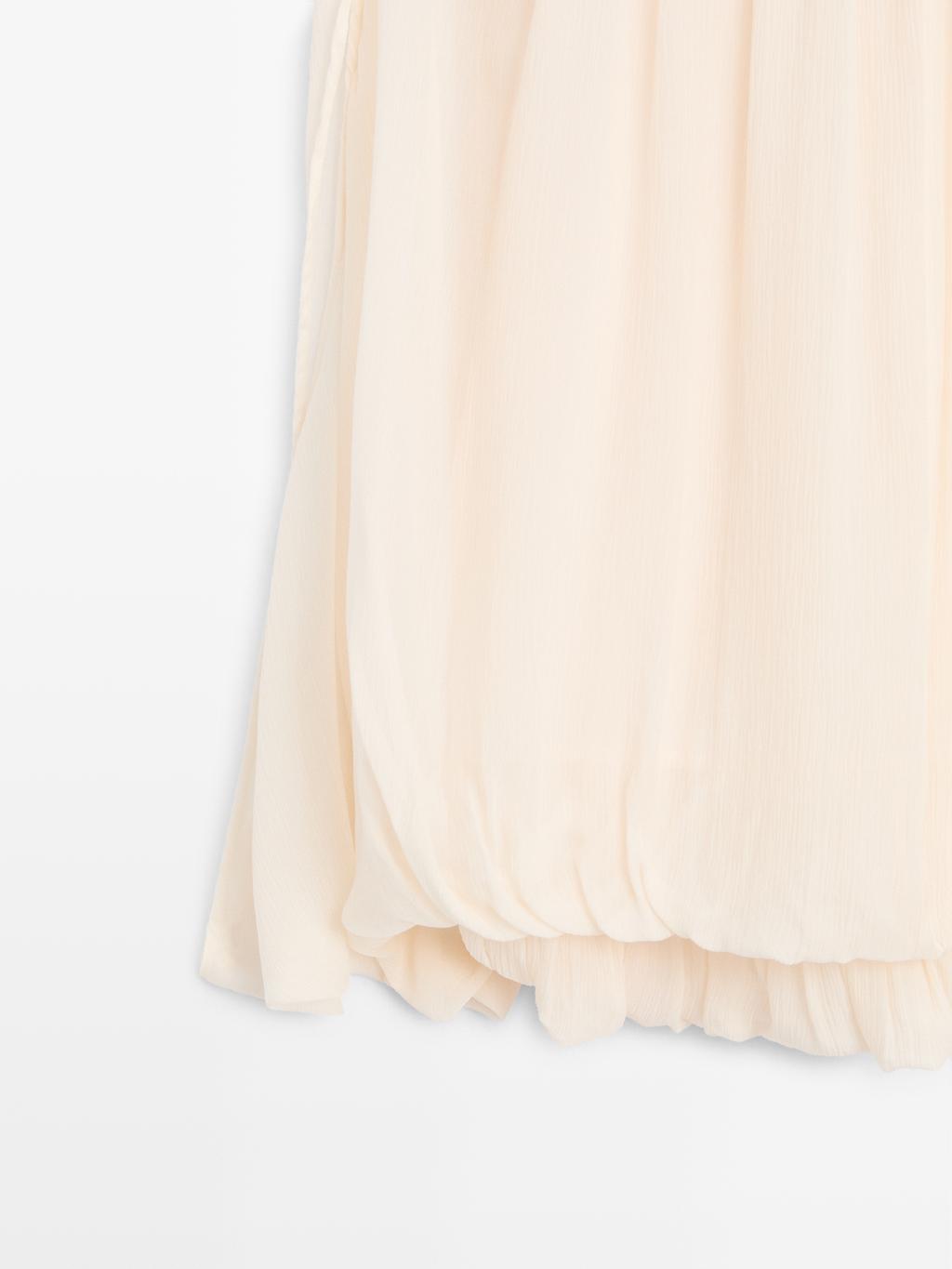 Voluminous flowing blouse