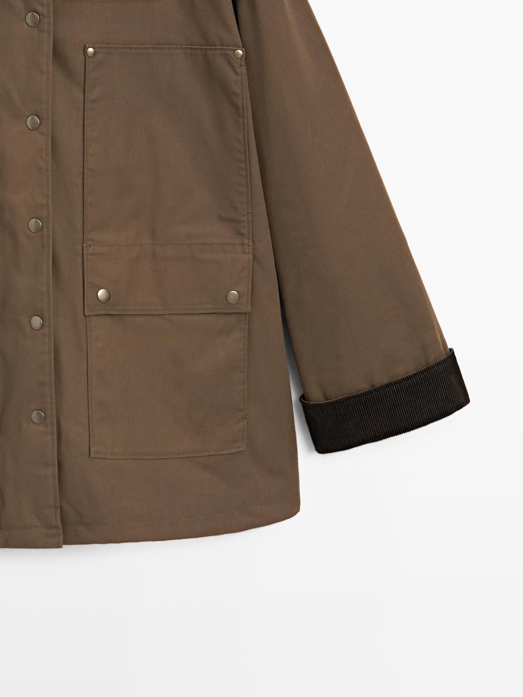 Waxed parka with corduroy detail
